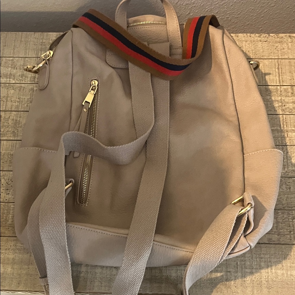 Stylish Beige Backpack with Gold Accents